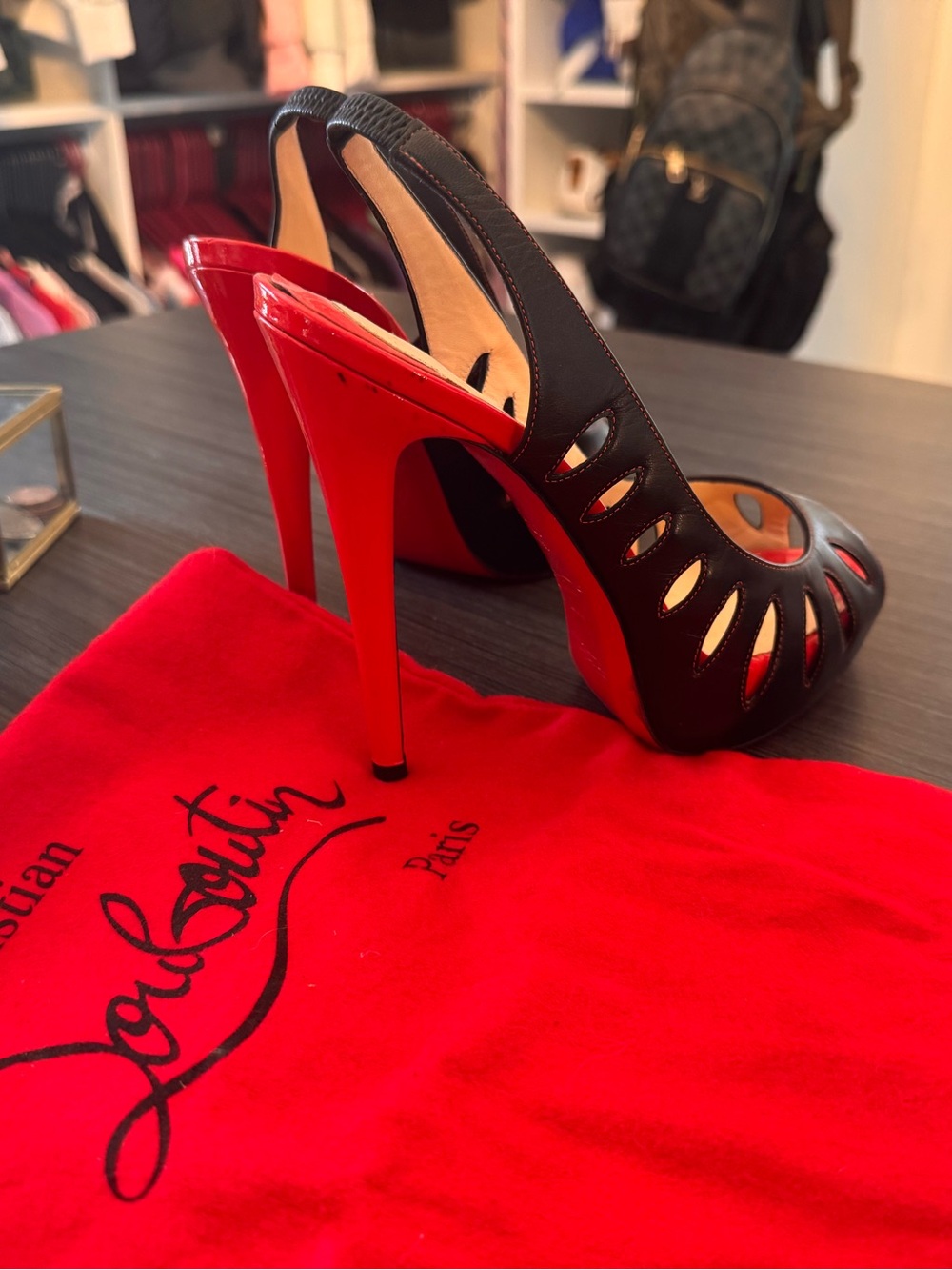 Christian Louboutin Black Peep-Toe laser cut Slingback Pumps with Red Platform